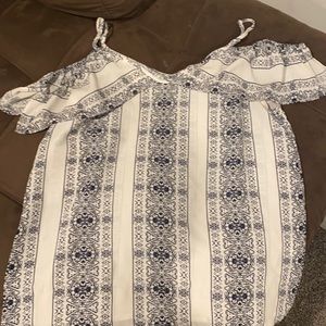 Skies are blue short sleeve white blouse with blue floral pattern